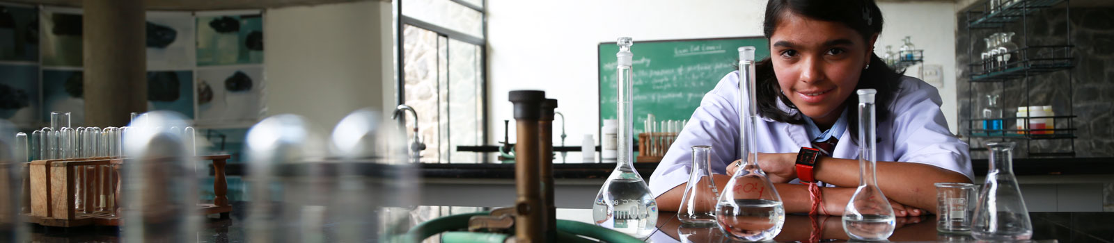 School girl in a school science laboratory 